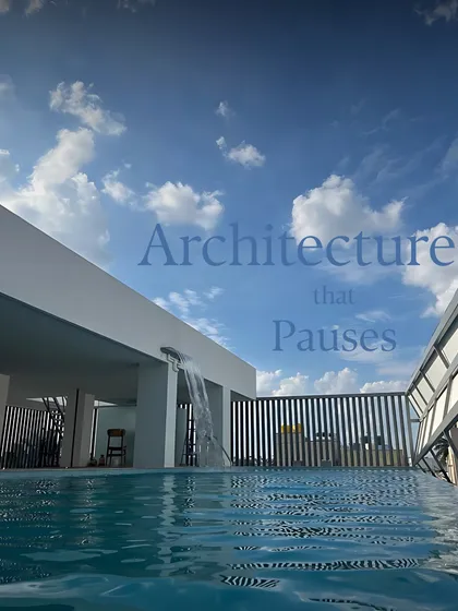 We design architecture that invites you to pause. This rooftop infinity pool, with its clean lines and gentle waterfall, creates a private escape against the open sky, offering a moment of calm and reflection in the city.