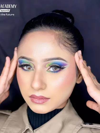 This powerful, straight-on look shows how the colorful eye makeup makes a statement. Students learn to create looks that are not only beautiful but also photograph exceptionally well.