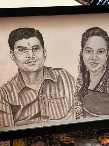 Here is the finished couple portrait, presented in a simple black frame. This shows how your custom sketch will look as a beautiful piece of wall art in your home.