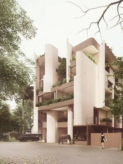 "The Nest" is a mixed-use building in Panjim designed to create privacy within an urban grid. We used soft, curved vertical fins to shield the interiors while creating recessed channels for vertical gardens and courtyards.
