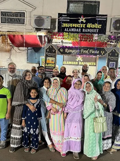 A large family group posing for a photo. We are happy to accommodate big groups.