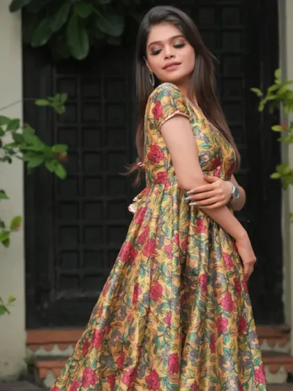 This floral Kalamkari print Anarkali dress has a wonderful flow and rich color palette. The V-neck and empire waist are classic details that I can incorporate into custom plus-size garments.