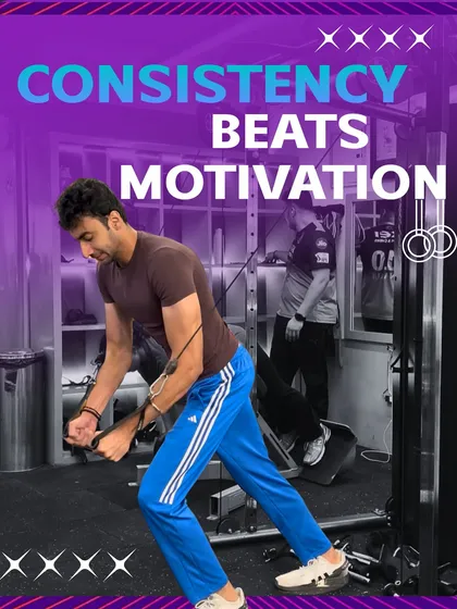 Consistency beats motivation. This shot captures the focus required for effective strength training on the cable crossover machine.