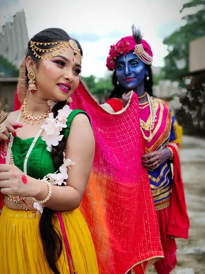 An outdoor shot of the Radha-Krishna look, demonstrating how the vibrant colors and details appear in natural light.