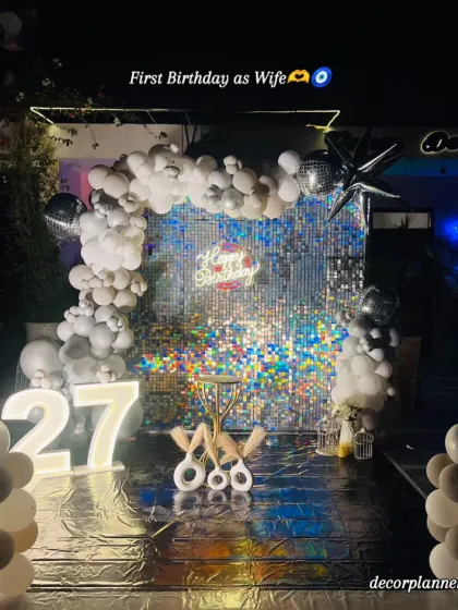This was for a 'First Birthday as Wife,' making it an extra special celebration. The glamorous silver theme was chosen to mark this beautiful milestone with elegance and sparkle.