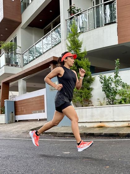 Taking flight during a run. This photo captures the feeling of power and freedom that comes from a strong, efficient running stride.