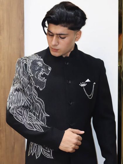 The complete look of the custom-made lion bandhgala. It's a piece that commands attention and showcases the bold, artistic side of my tailoring.