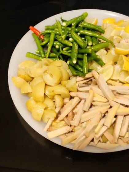 Another angle of the fresh ingredients for our mixed pickle. We believe in transparency and showing you the goodness that goes into every jar.