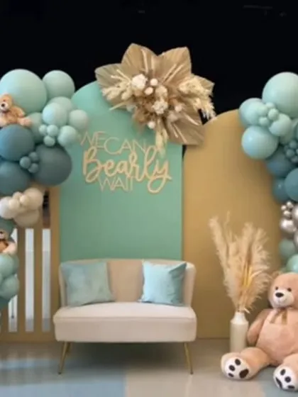 A wider shot of the teal teddy bear theme, showing the full scale of the backdrop against the stage. This design is perfect for larger venues and creates a significant visual impact.
