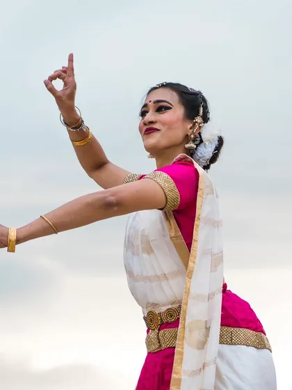 A close-up from the Paris photoshoot, highlighting the intricate hand gestures and expressive face of Bharatanatyam. This is a great example of a dance-centric portrait.
