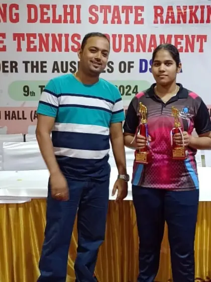 Our coach with Ayushi after her double-medal performance, winning Gold in U-15 and Bronze in U-17 girls at the Delhi State Ranking tournament.