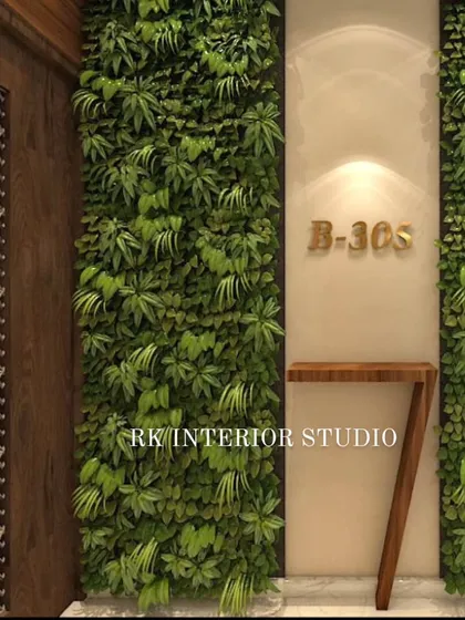 A 3D render of a luxury foyer design. This concept includes a vertical green wall, a sleek wooden console, and a modern nameplate, creating a fresh and natural entrance.
