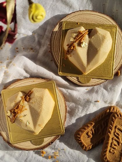 An overhead shot of my mini heart-shaped Biscoff cheesecakes. They are perfect for special occasions, anniversaries, or as a sweet gift for someone you love.
