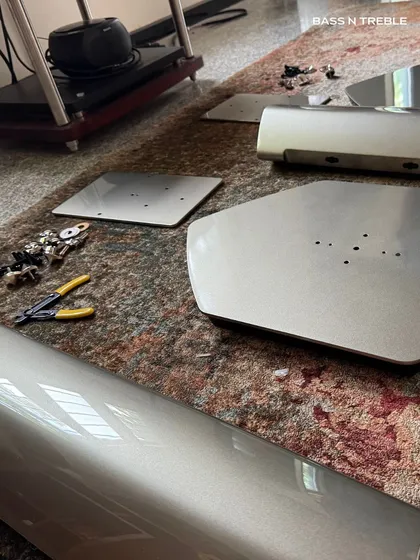 The components of a TAD speaker stand laid out before assembly. Every part, down to the Furutech connectors and cables, is chosen for its contribution to the final sound.