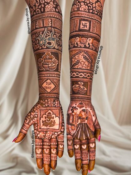 A full-coverage bridal mehendi telling a story with a couple portrait, Ganesha, and various symbols of Hindu wedding rituals.