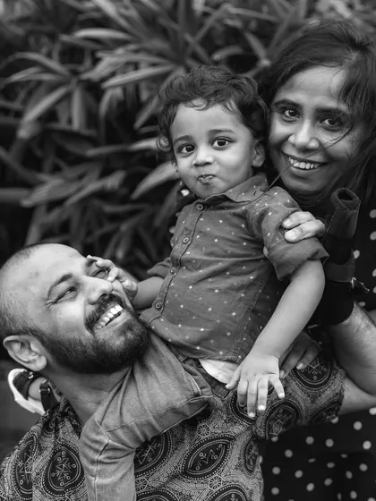 Sometimes, a black and white photograph can tell the most powerful story. By removing color, we focus purely on the emotion, the connection, and the joyful chaos of this family moment. It adds a timeless, artistic quality to your gallery of memories.