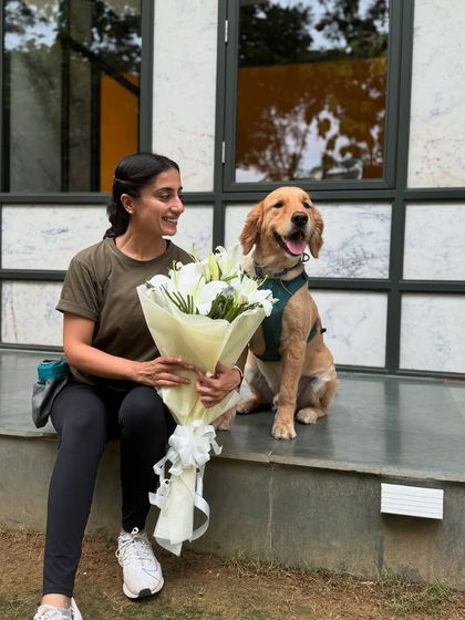 A beautiful Golden Retriever brought me flowers! The love and appreciation from our clients and their pups is the best reward.