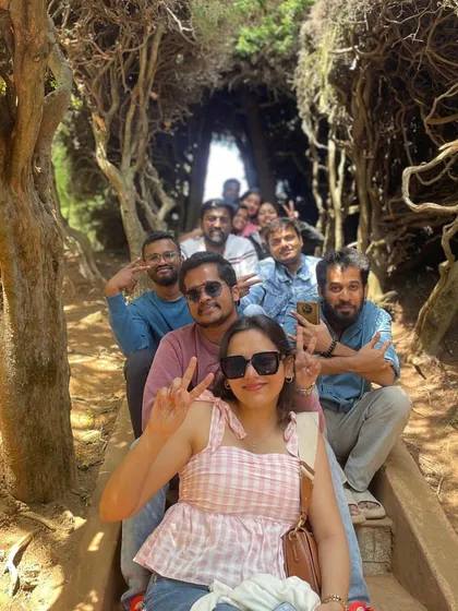 Exploring the unique Guna Caves in Kodaikanal, with its fascinating network of intertwined tree roots. It's a fun and slightly spooky adventure for the whole group.