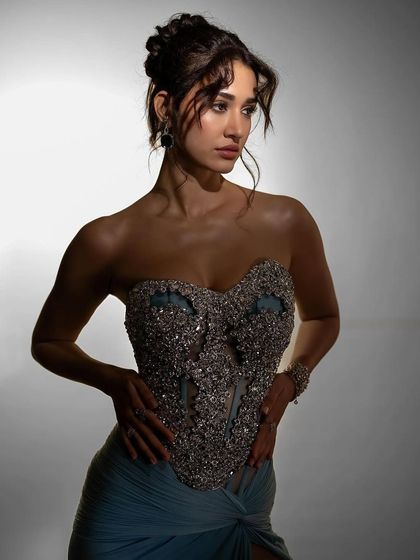 A full view of the stunning Falguni Shane Peacock gown for ELLE India. The makeup look was all about modern glamour, with a focus on sharp eyes and glowing skin.