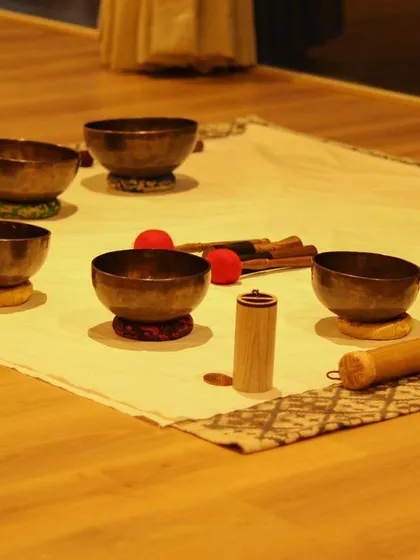 The warm, ambient lighting of the studio enhances the calming effect of the sound healing instruments. This environment is intentionally created to feel safe, peaceful, and conducive to healing.