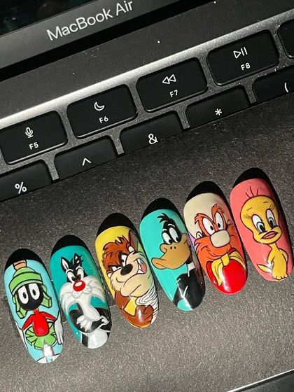 That's all, folks! A full set of Looney Tunes nails, bringing all the chaotic energy of my childhood Saturday mornings. I hand-painted everyone from Marvin the Martian and Sylvester to the Tasmanian Devil and Tweety Bird.