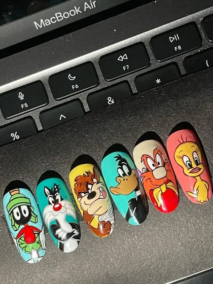 That's all, folks! A full set of Looney Tunes nails, bringing all the chaotic energy of my childhood Saturday mornings. I hand-painted everyone from Marvin the Martian and Sylvester to the Tasmanian Devil and Tweety Bird.