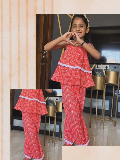 This vibrant chevron print set just makes me smile. The peplum top and flared pants are so fun, and the delicate white lace adds a sweet touch. It's all about happy clothes for happy kids.