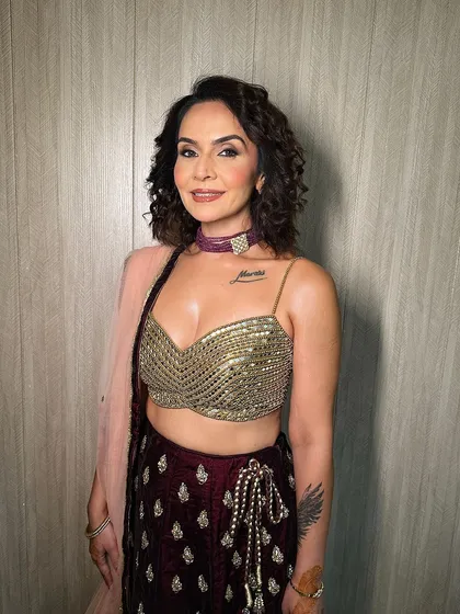 The full look for this wedding guest. The makeup complements her modern lehenga and chic hairstyle, creating a stylish and sophisticated appearance.