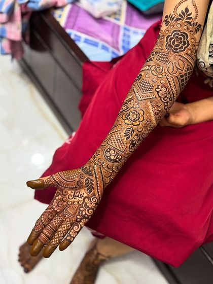 A single-arm view, showing the flow of the design from the palm to the elbow.