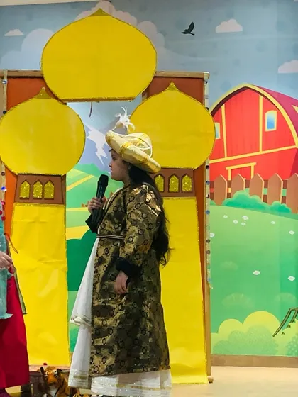 Two performers in costume deliver their lines during the Aladdin musical theatre show.
