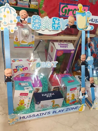 'Hussain's Play Zone', a hamper packed with various toys and games for the newborn.