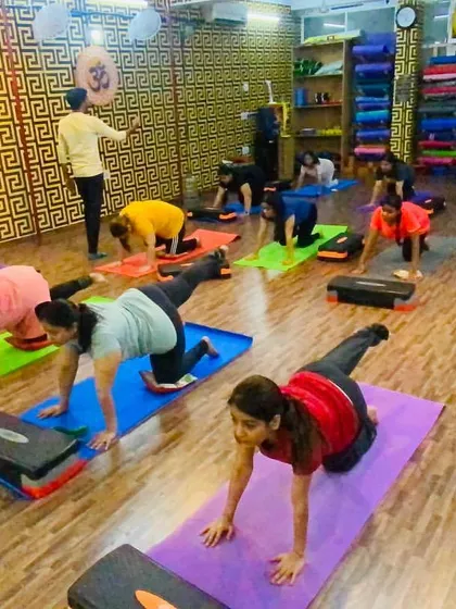 Full house for our morning aerobics class! We use steppers and bodyweight exercises to get your heart pumping and build stamina. It's high energy and lots of fun.