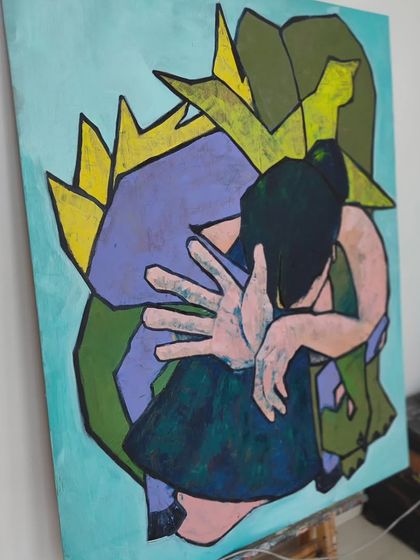 A side angle of the oil painting on plywood, showing its texture and presence on the easel.