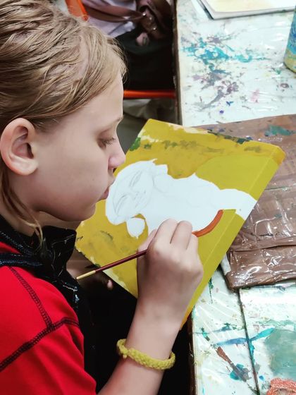 Follow along as a young student works diligently on her portrait painting, from the first outline to the final expressive details.