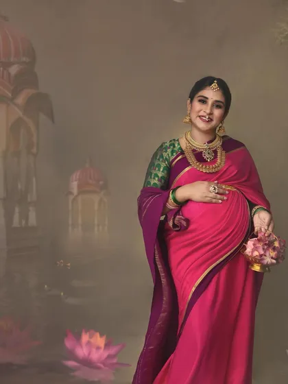 A wider view reveals the custom backdrop, inspired by the architecture of Hyderabad to reflect the client's roots. This is how I weave personal stories into each artistic maternity session.