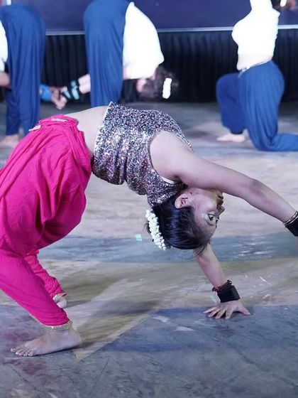 Backbend for mind, body, and soul. A simple wheel pose performed with grace during our annual event.