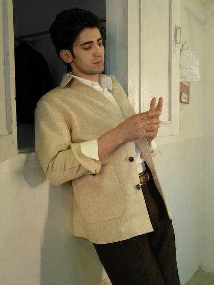 Experience Italian elegance with this linen ensemble, a chic and sophisticated look that is perfect for any occasion.