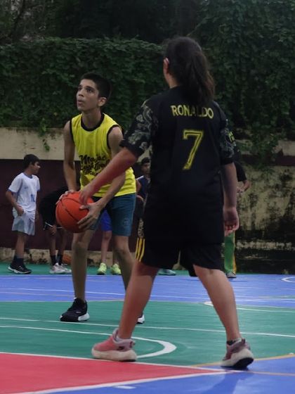 Players learning to read the play and position themselves correctly. Teamwork and court awareness are just as important as individual skill.