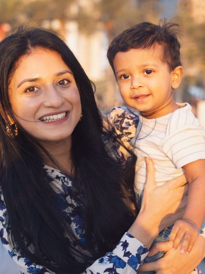 A beautiful mother and son portrait, bathed in the warm glow of the setting sun. Golden hour light is truly magical.