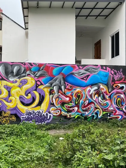 The full wall from our Jakarta jam. A crazy mix of styles, from my curvy letters to my boy's character work.