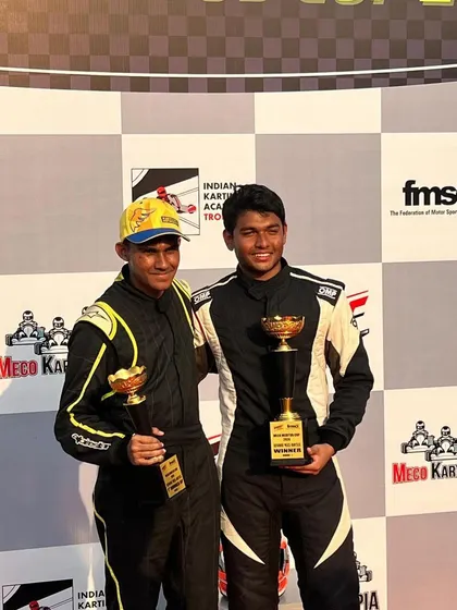 Two of our drivers sharing a moment of victory after the Meritus Cup race.