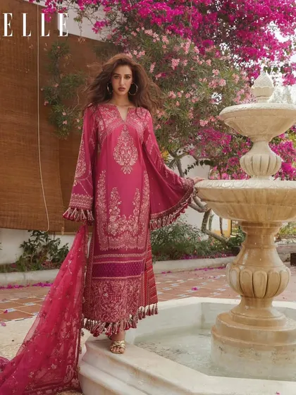 Another look from the ELLE shoot in Thailand. The vibrant pink outfit called for a makeup look that was equally bright and beautiful, with a focus on glowing skin and a matching pink lip.
