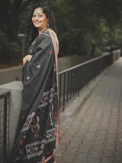 A simple, elegant black saree is always a classic. I believe your style should be an authentic expression of who you are, and I'm here to help you find and refine that unique voice.