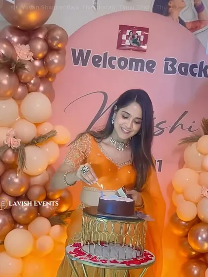 I was honored to create this warm welcome home party for Bigg Boss Kannada contestant Mokshitha Pai. The rose gold and peach balloon decor with personalized photo hangings made for a sweet and stylish celebration.