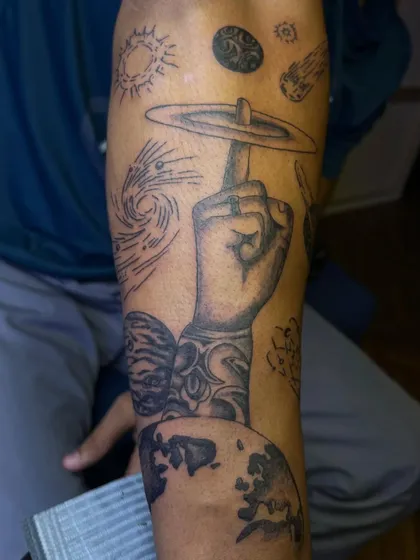 This is part of a larger custom sleeve project built around a cosmic theme. I enjoy weaving together different elements like planets, galaxies, and personal symbols to tell a complete story on the skin.