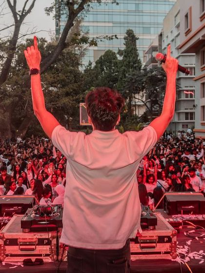 Another angle from the MCC festival, showing the massive crowd of students filling the college grounds.