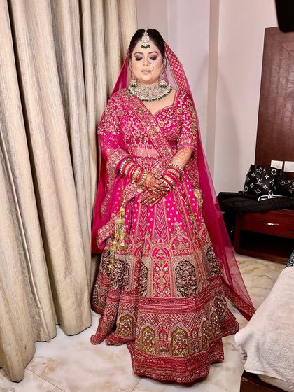 The complete bridal ensemble. The makeup, hair, and outfit all come together to create a look that is nothing short of breathtaking.