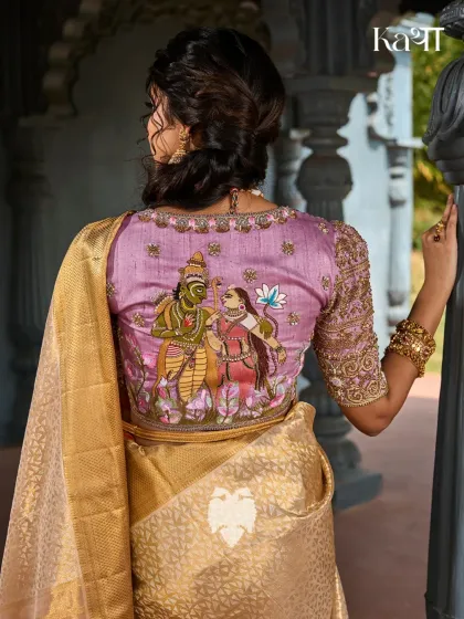 Here, mythology becomes wearable art. This blouse from my Janaki Rama series portrays the divine bond of Sita and Rama. The story is hand painted and then intricately embroidered on the back of the blouse, creating a piece that is both a garment and a sacred tribute.