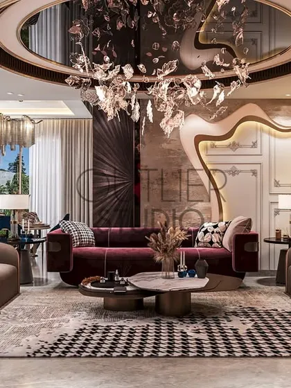 This perspective showcases the living room's dramatic flair, with a flowing artistic wall feature and a bold red sofa. The mix of a checkered rug and a sculptural chandelier adds layers of modern elegance.