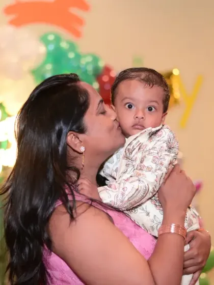 A mother and her baby sharing a kiss. These tender family moments are priceless.